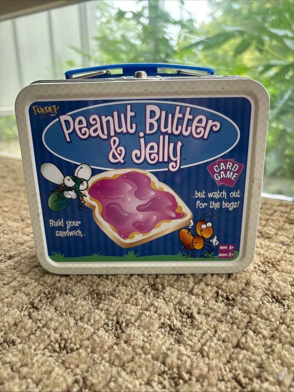 Peanut Butter & Jelly Card Game Tin - closes well but missing closure on case